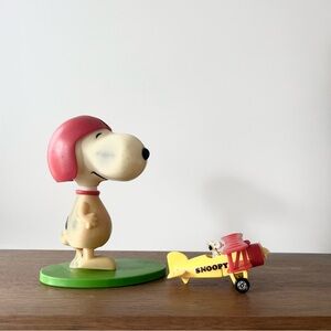 Set of 2 Snoopy Collectibles Universal Product 1958 Kicking Football Aviva Plane